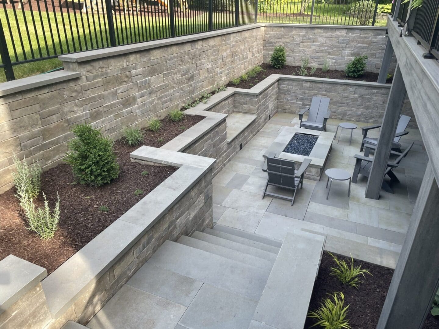 Professional bluestone patio, steps, and retaining walls in Clarendon Hills, IL