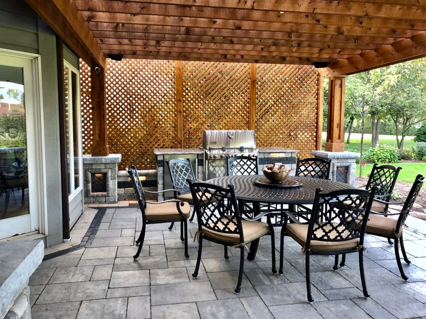 Unilock patio with outdoor kitchen and outdoor grill installation in Naperville, IL