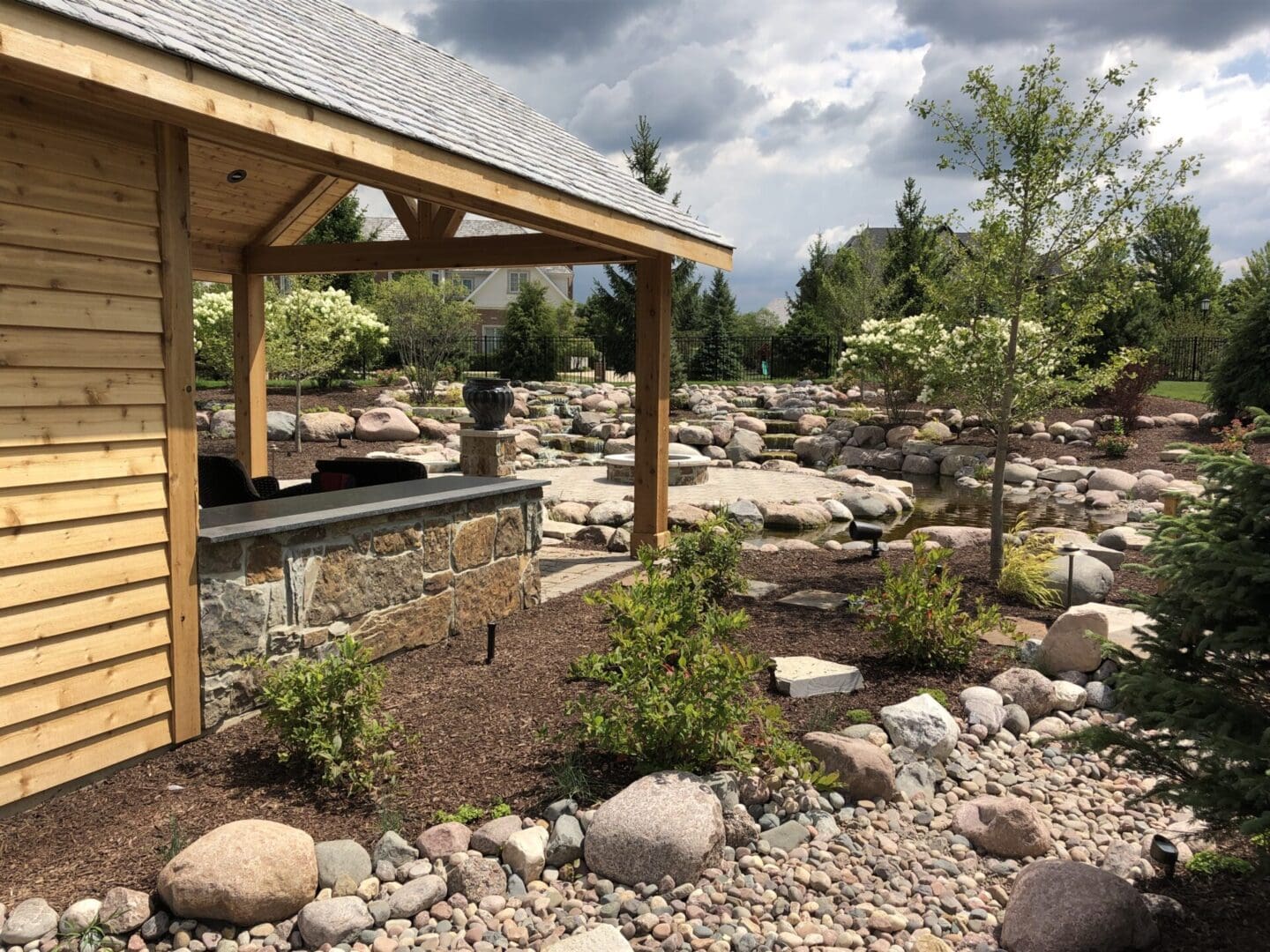 Custom pavilion and pond installation in Palos Park, IL